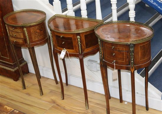 A pair of French Transitional style mahogany tables, ormolu-mounted and fitted three drawers and a similar demi-lune table pair W.41cm